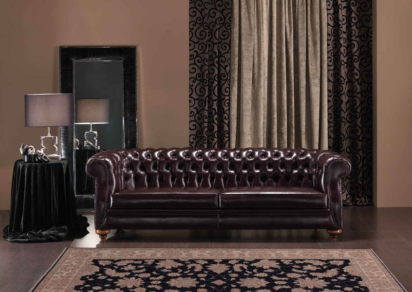 Our table lamp Iceberg in plexiglas, Nautilus shell, and black crystal box with crocodile; Behind the luxurious sofa of the prestigious Company Bedding, Pistoia Italy, our big mirror in black eel, and brass nickel plated